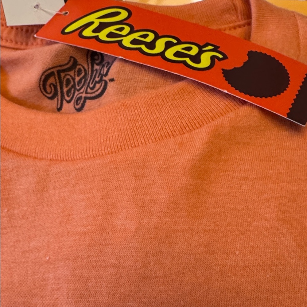 Reese’s Peanut Butter Cup T-Shirt. Size Medium 
Unisex. Short Sleeves NWT - Picture 9 of 9
